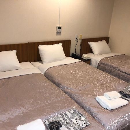 Business Hotel Kudo Nobeoka Bagian luar foto