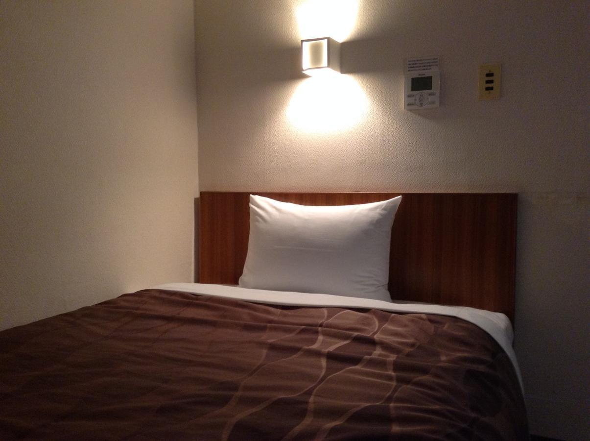 Business Hotel Kudo Nobeoka Bagian luar foto